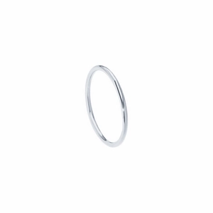 Macro shot of minimalist silver minimalist ring band with polished metallic finish
