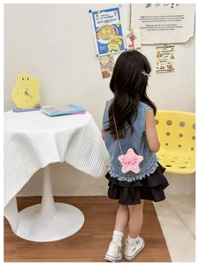 Sac bandoulière enfant en forme d'étoile rose avec nœud et perles dorées