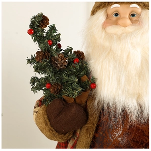 Detail of Santa Claus figure holding a small green pine tree with red berries