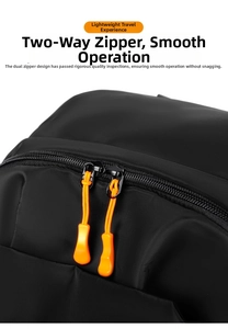 Detail of waterproof backpack showing smooth dual zippers with orange pull cords