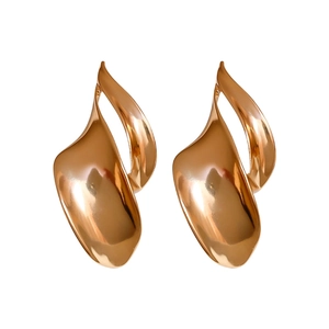 Modern irregular geometric rose gold stud earrings with polished abstract streamlined design