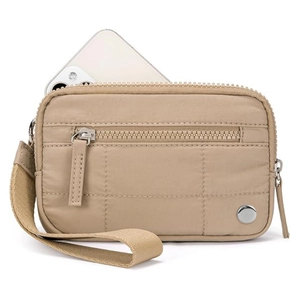 Khaki quilted nylon wristlet bag showing storage capacity with a smartphone inside