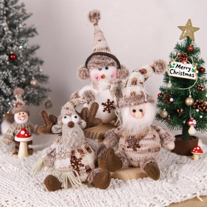 Charming knitted Christmas plush figurines featuring snowman, reindeer and Santa Claus