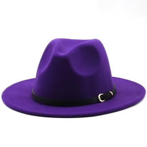 Detail of purple wool fedora hat with black leather band and gold metal buckle