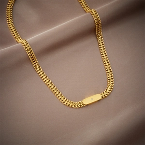 Gold plated hip hop chain necklace featuring a rectangular pendant with small diamonds