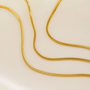 Minimalist 18K gold plated stainless steel snake chain bracelet with a polished finish
