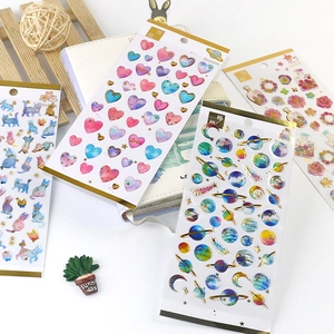 Dreamy gold foil decorative stickers set with cats, hearts, and planet themes for journaling