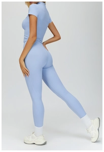 Detail view of the back cut and fit of this light blue seamless yoga set for women