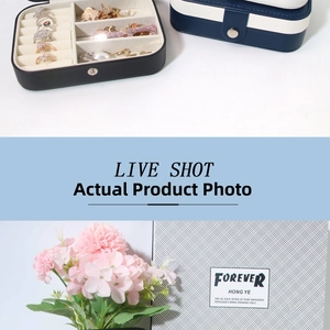 Detail view of portable travel jewelry box with velvet ring slots and PU leather finish