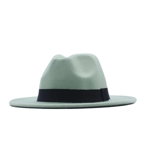 Close-up of light green felt fedora hat with a contrasting black decorative ribbon band
