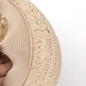 Close-up of handmade straw jazz hat showing detailed woven texture and inner stitching