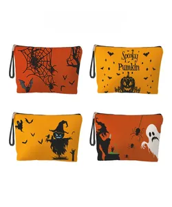 Detailed pattern display of Halloween makeup bags with pumpkin and scarecrow prints