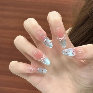 Blue leopard print bow long almond press-on nails with pink gradient and pearl accents