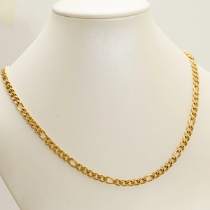 Classic 18k gold plated stainless steel Figaro chain necklace displayed on a white bust
