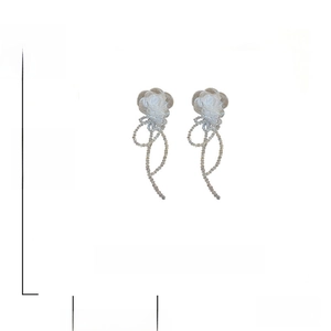 Detail of white rose earrings with crystal tassels showing size and weight specifications