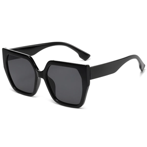 Modern square oversized sunglasses with thick black frames and dark lenses for fashion