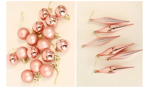 Close-up of rose gold Christmas ball ornaments with glossy and spiral matte textures