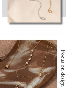 Détail du collier en Y avec pendentifs en zircon blanc en finitions or et argent