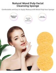 Three yellow wood pulp cleansing sponges with honeycomb texture for facial skin care