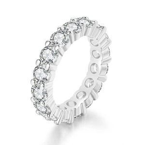 Macro view of 4mm eternity ring with round brilliant-cut stones in prong setting