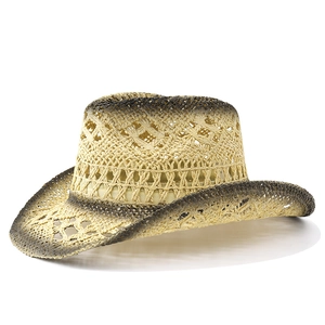 Detail of hollow-out straw weave and black gradient edges on Western cowboy hat
