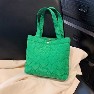 Fresh green heart-quilted Oxford tote bag with top handle and metal magnetic closure
