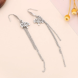 Detail of silver long tassel earrings with S925 engraved Tree of Life pendant
