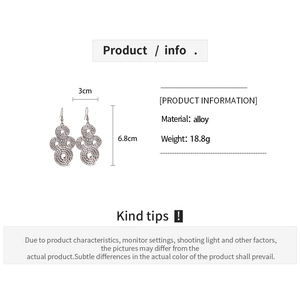 Detailed dimensions of silver pleated spiral earrings measuring 6.8cm in length and 3cm wide
