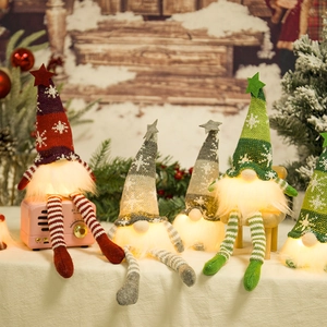 Lighted Christmas gnomes with long legs and LED stars for holiday home decoration