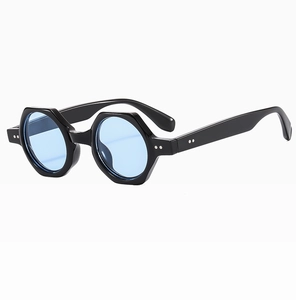 Detail of polygon round frame sunglasses with light blue lenses and metal rivets