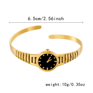 Detail view of gold watch-style open bangle with dimensions 6.5cm and 10g weight