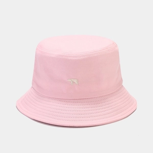 Detail of pink cotton bucket hat featuring white polar bear embroidery and stitched brim