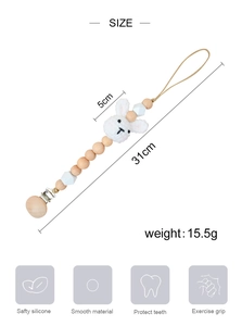Detail view of 31cm handmade crochet rabbit pacifier clip with dimensions and weight info