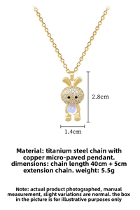 Detail of gold titanium rabbit necklace with zircon pavé and 2.8x1.4cm dimensions