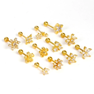 Set of gold stainless steel stud earrings featuring zircon stars and flowers