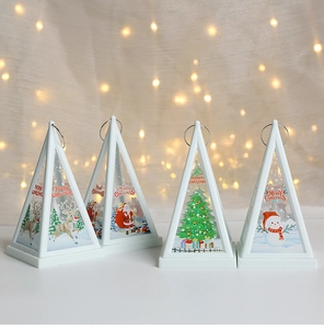 Detail of four triangular Christmas lanterns featuring Santa, snowman and deer designs