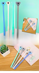 Detailed close-up of cute koala gel pens in blue, white, green and grey colors