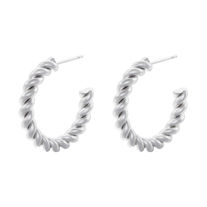 Detailed view of silver C-shaped twisted hoop earrings with a glossy metallic finish