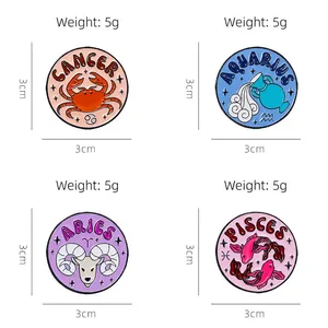 Enamel zodiac pins set including Cancer and Aries designs, 3cm diameter metal badges