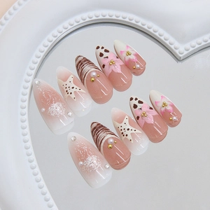 French style starfish and pearl press-on nails with 3D flower designs on almond shape