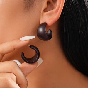 Matte black geometric C-shape stud earrings in minimalist retro style for women