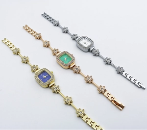 Three elegant square quartz watches with floral rhinestone bracelets in silver, gold, and green