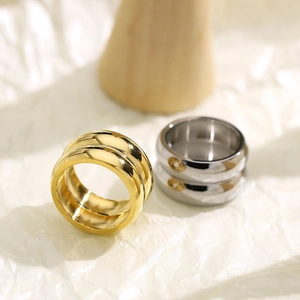 Minimalist double banded titanium steel ring in gold and silver with polished mirror finish