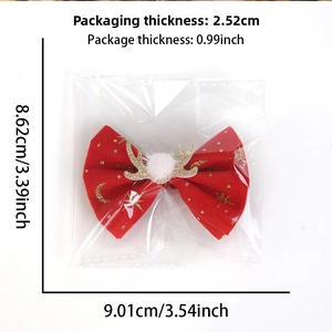 Detailed size specifications of the velvet Christmas reindeer bow hair clip in a clear bag