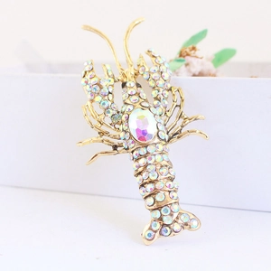 Golden lobster brooch with colorful rhinestones and a large iridescent cabochon stone