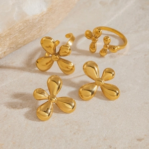 Elegant gold flower ring and earrings set in premium stainless steel on stone