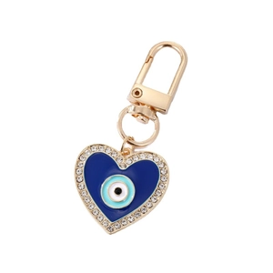 Golden heart-shaped Evil Eye keychain with blue enamel inlay and sparkling rhinestones
