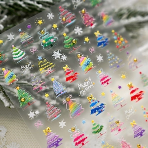 Colorful 3D Christmas tree nail stickers with stars and snowflakes on white lace