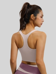 Brassière de sport rose dos nageur avec legging de yoga bicolore pour femmes