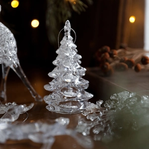 Sparkling clear acrylic Christmas tree ornament with snowy glitter and silver string